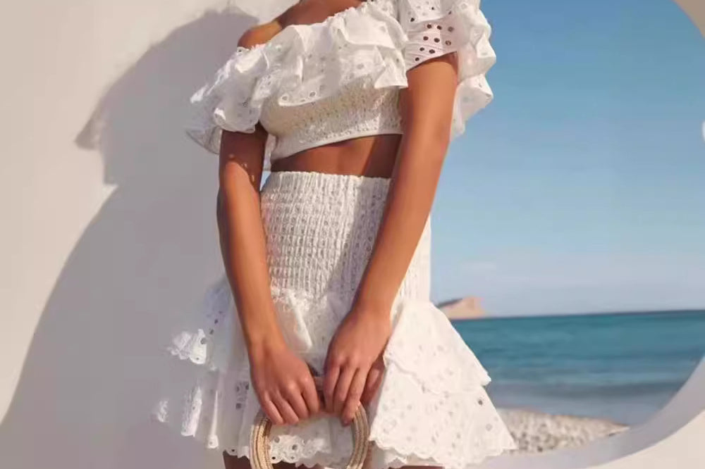 Australian cut-out embroidered one-shoulder stretch cropped top + ruffled high-waisted slimming skirt set    